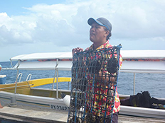 Rack of oysters ready for lowering into water.