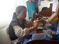 Pearl Technician seeding the oyster.