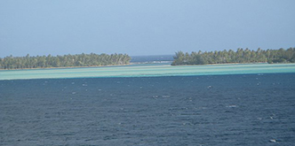 The gap above is the only way in and out of the lagoon shared by Raiatea and
  Taha’a.